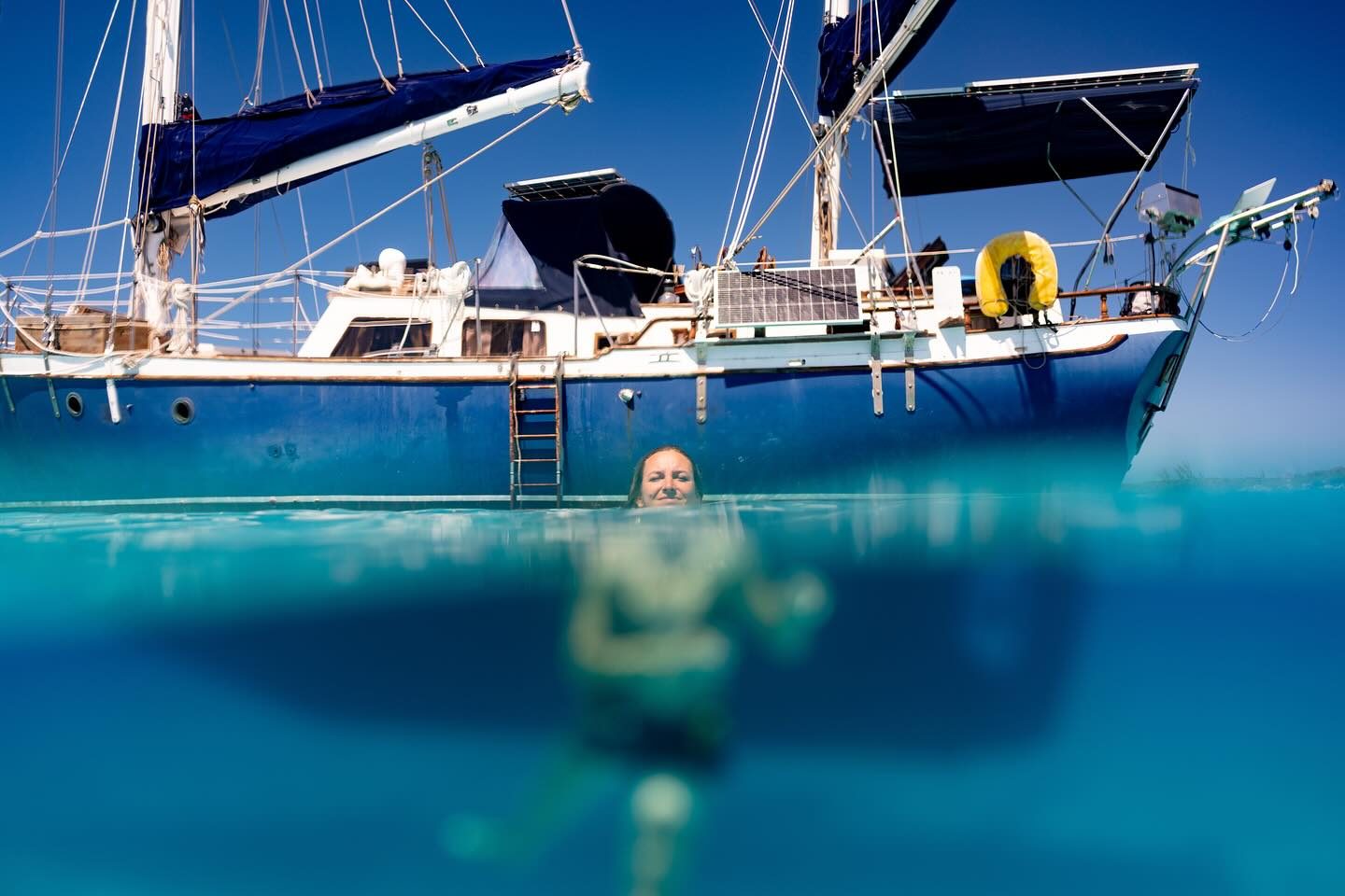 A swimmer below Starchaser’s hull